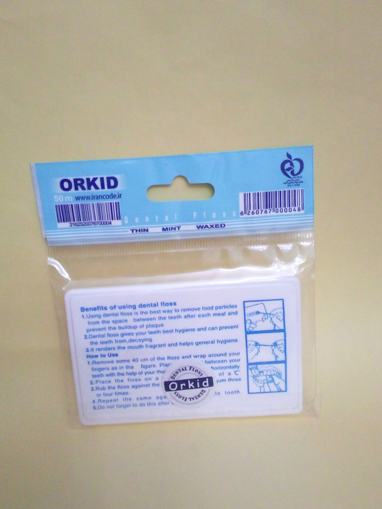بهداشتی  آرایشی رامین،آرش نخ دندان کتابی ارکیدمدل جالب حمل آسان داخل کیف وهرمکان نخ ۵۰متر