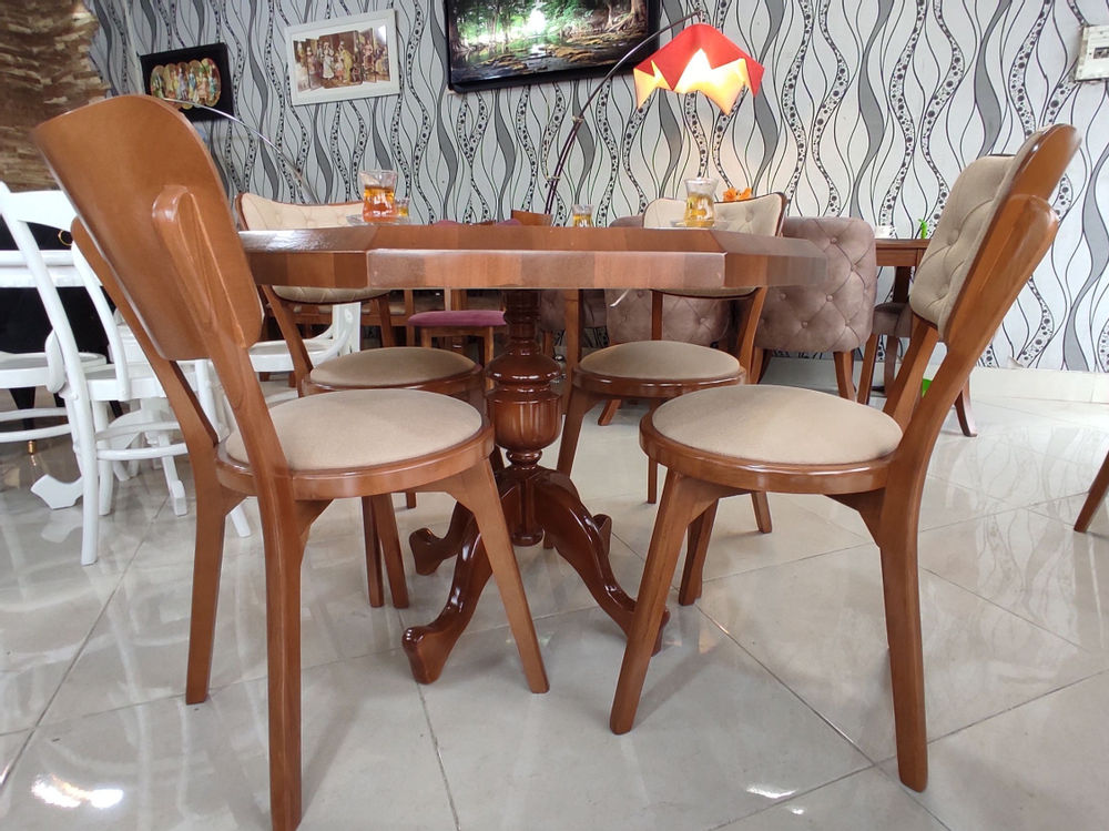Home Style Wood صندلی الینا و میز ۸ ضلعی 
جنس چوب صندلی تمام راش میباشد 
این مدل در اندازه های ۲ و ۴ و ۶ نفره تولید میشود
رنگ چوب و پارچه به دلخواه مشتری قابل تغییر میباشد