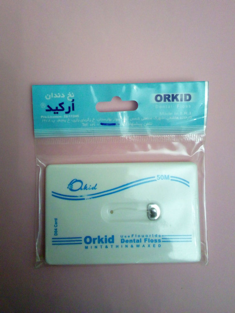 بهداشتی  آرایشی رامین،آرش نخ دندان کتابی ارکیدمدل جالب حمل آسان داخل کیف وهرمکان نخ ۵۰متر