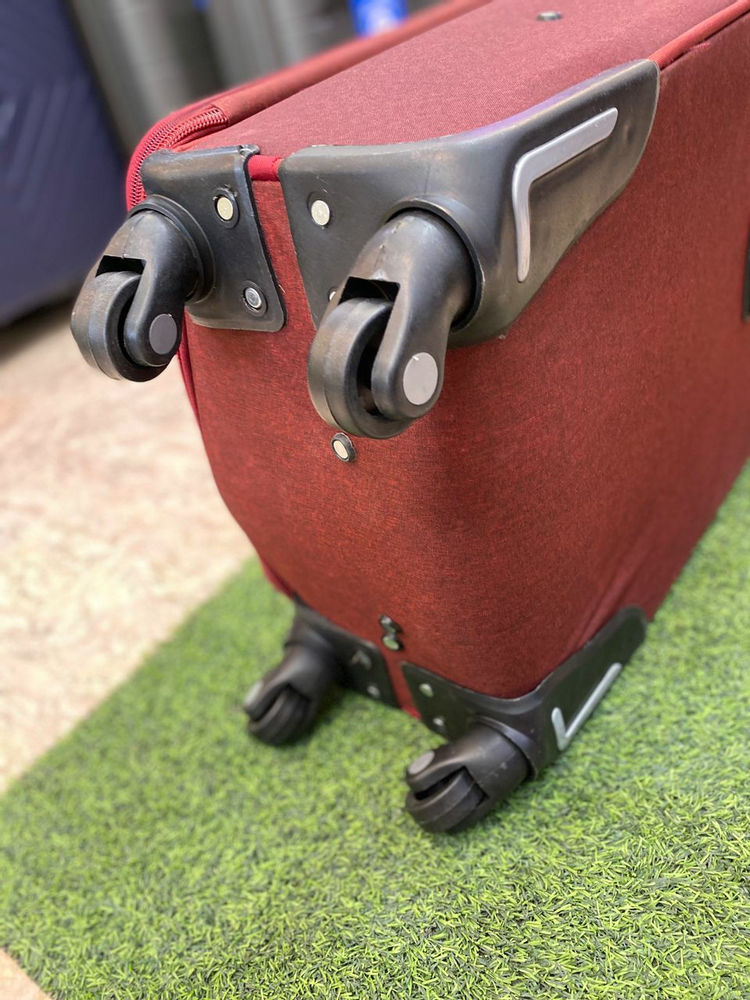چمدان پاپیروس پارچه ملانژ  دسته جلیقه ای  محفظه لباس خیس چهار چرخ دسته تراولی استیل در 6 رنگ متفاوت (زرشکی-بنفش-سورمه ای-طوسی-قهوه ای-مشکی)